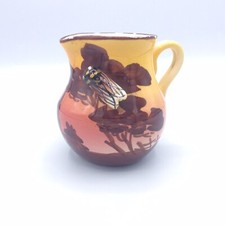 Pot à lait en céramique de Vallauris décor olivier et cigale par François Sicard