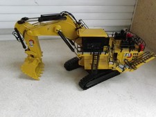 PELLETEUSE CATERPILLAR 6030 BH 1/48 . CCM. DRAKE .WSI . NZG . CONRAD . TEKNO .