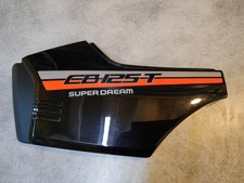 Cache latéral gauche noir (R109) CB125T 1990 NOS HONDA 83640-KC1-000ZCNOS