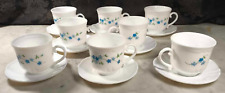 8 petites tasses à café et soucoupes Arcopal série Veronica motifs Myosotis 80'
