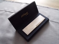 BRIQUET DE TABLE StDupont en argent plaqué. Très bon état car peu servi.