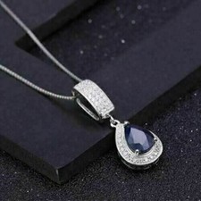 Pendentif halo saphir bleu