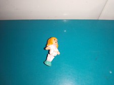 Polly pocket figurine doll