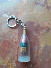 Ancien porte clé bouteille - porte,