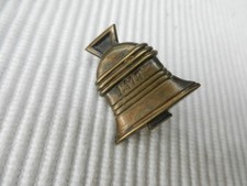 petite cloche L.M.T. en laiton