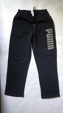 Jogging puma en tissu taille L 35cm a la taille 104cm longueur