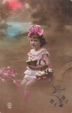CP HEUREUSES PAQUES PETITE FILLE RUBAN SUR LA TETE AVEC PANIER OEUFS - 34709