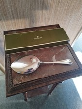 Cuillère pelle service à - de,