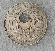 MONNAIE FAUTEE TROU DECALE 10