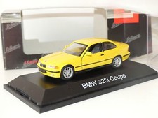 BMW SERIE 3 E36 325 i COUPE Jaune SCHUCO 1:43