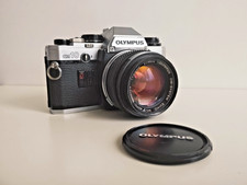 Appareil photo Olympus OM-10 35mm SLR ZUIKO MC AUTO-S 50mm F1.4 fonctionnel