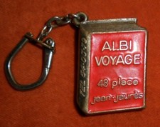 Porte-clés Key Ring Livre métal ALBI VOYAGE 48 place J Jaurès Librairie de poche
