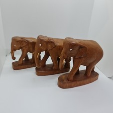 3 sculptures d'éléphants en