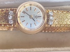 montre omega femme or 18K de