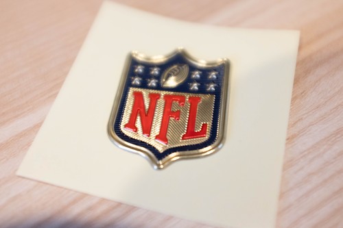 Gold nfl shield - mvp, on