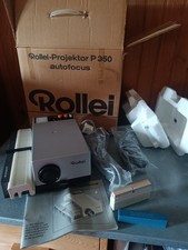 Projecteur de diapositives Rollei P 350 complet dans sa boîte d'origine.