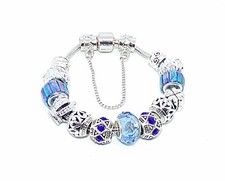 Cadeau Noël -Bracelet avec des charms argentés et bleus - Neuf jamais porté