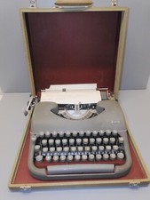 - ANCIENNE MACHINE A ECRIRE JAPY DANS SA MALLETTE de TRANSPORT  FONCTIONNE   D