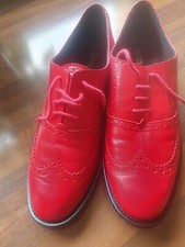 paire mocassins rouges en cuir