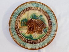 Dessous de plat rond en barbotine CHIEN DANS SA NICHE