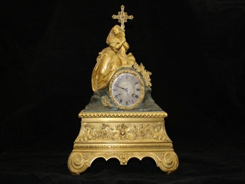 Pendule restauration bronze