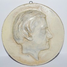 Médaillon rond en plâtre en