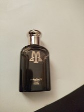 Une Miniature De Parfum