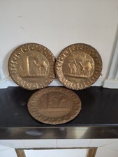 3 assiettes en cuivre