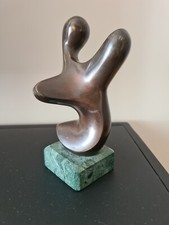 sculpture bronze sur marbre