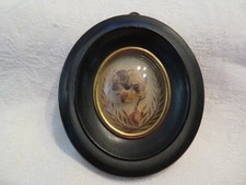 ancien reliquaire cheveux dans son cadre en bois noircie napoléon III