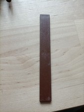 PLAYMOBIL  PLANCHE MARRON OU AUTRE 10,6 CM SUR 1,3 CM. ( 110. )