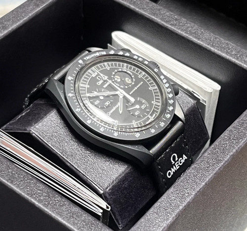 Montre swatch omega - x,