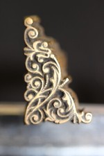 FER   A  DORER  DE  RELIEUR  PETIT  ANGLE   ÉPOQUE  19 ÈME  EMPIRE  N° 3