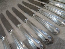 11 couteaux de table métal