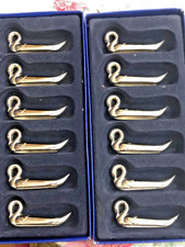 12 PORTE COUTEAUX METAL ARGENTE "CYGNE"