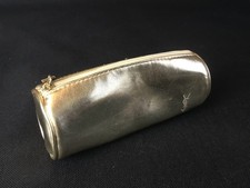 Trousse dorée Yves Saint
