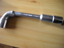 Clé pipe débouchée - à,