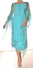 Ensemble cérémonie bleu turquoise jupe haut boléro taille 40 Christine Laure