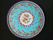 Grand plat rond en émaux de LONGWY signé, décor fleurs et oiseau 