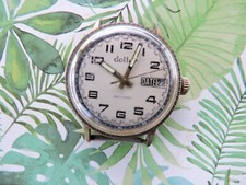 ancienne montre bracelet dollar plaque or avec dateur montre vintage circa