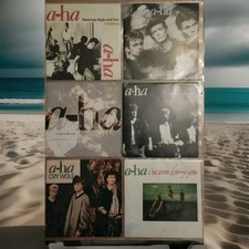 1 disque 45 tours vinyle A-HA à choisir parmi le lot