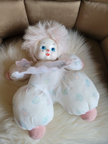 Petite poupée tête plastique - petite,