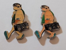 PINS  BANDE DESSINEE HUMORISTIQUE LUCIEN PLAGE MARGERIN 1987  2 PINS