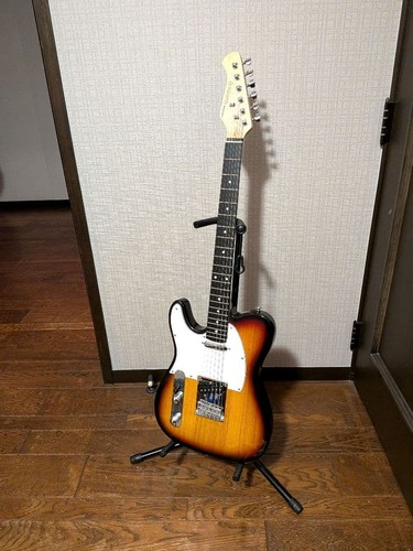 Guitare modèle gauche - , donner