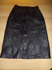 Jupe simili cuir figure taille 36 ( 34 cm taille 68 cm de long )