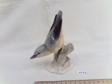 Ancien oiseau en porcelaine