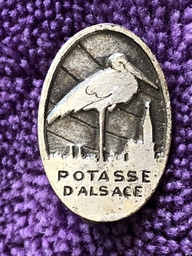 Insigne commerçant la - de,