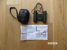 Jumelles compactes 8x21 comme neuves avec leur étui de rangement.