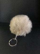 Porte Clefs Pompon en fourrure synthétique beige, bijou de sac