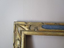 Cadre ancien en bois sculpté